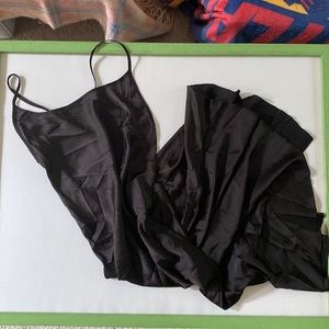 Sheer mid length black slip dress with side slit